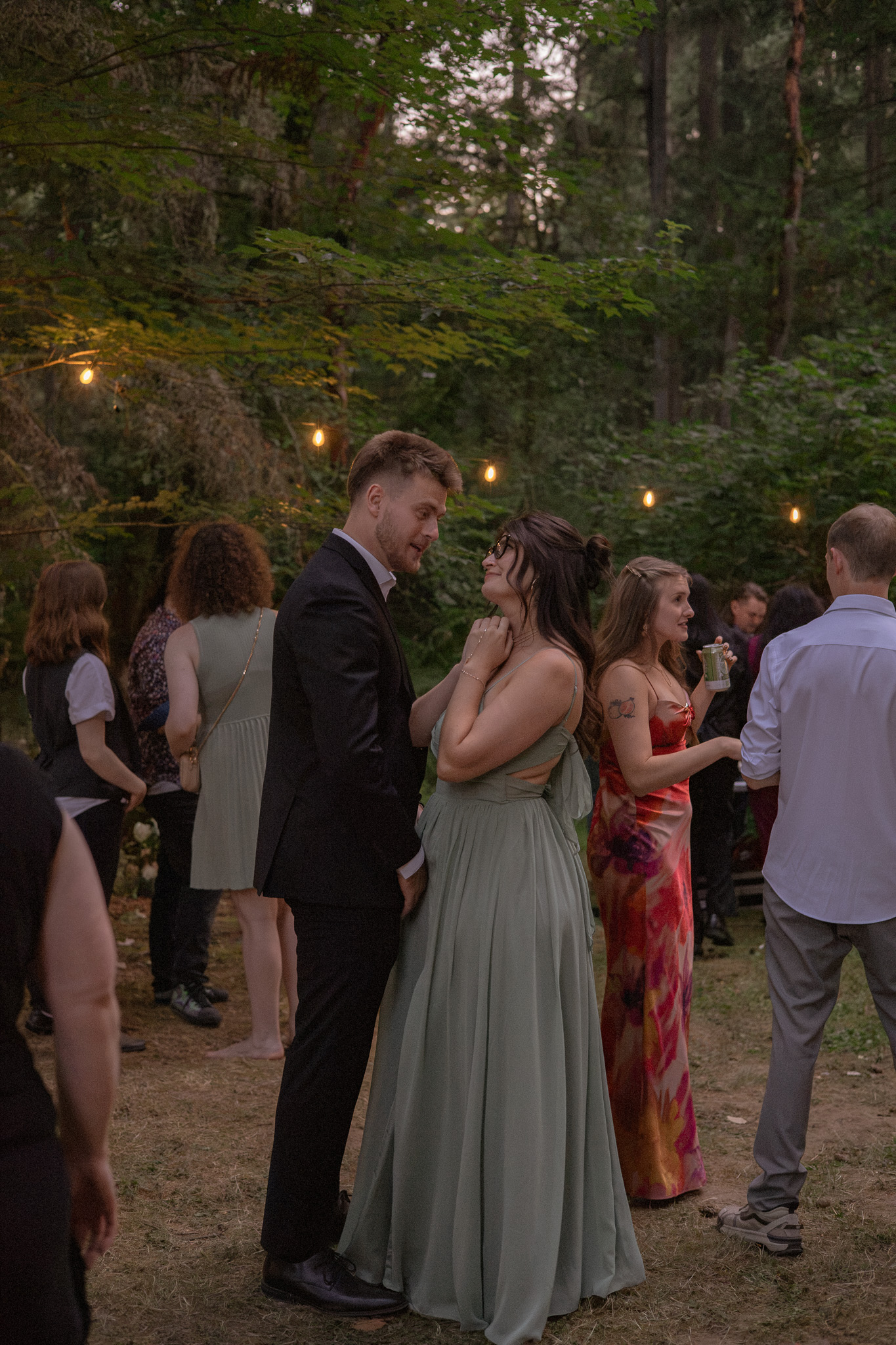 Siblings back-to-back in the late golden light