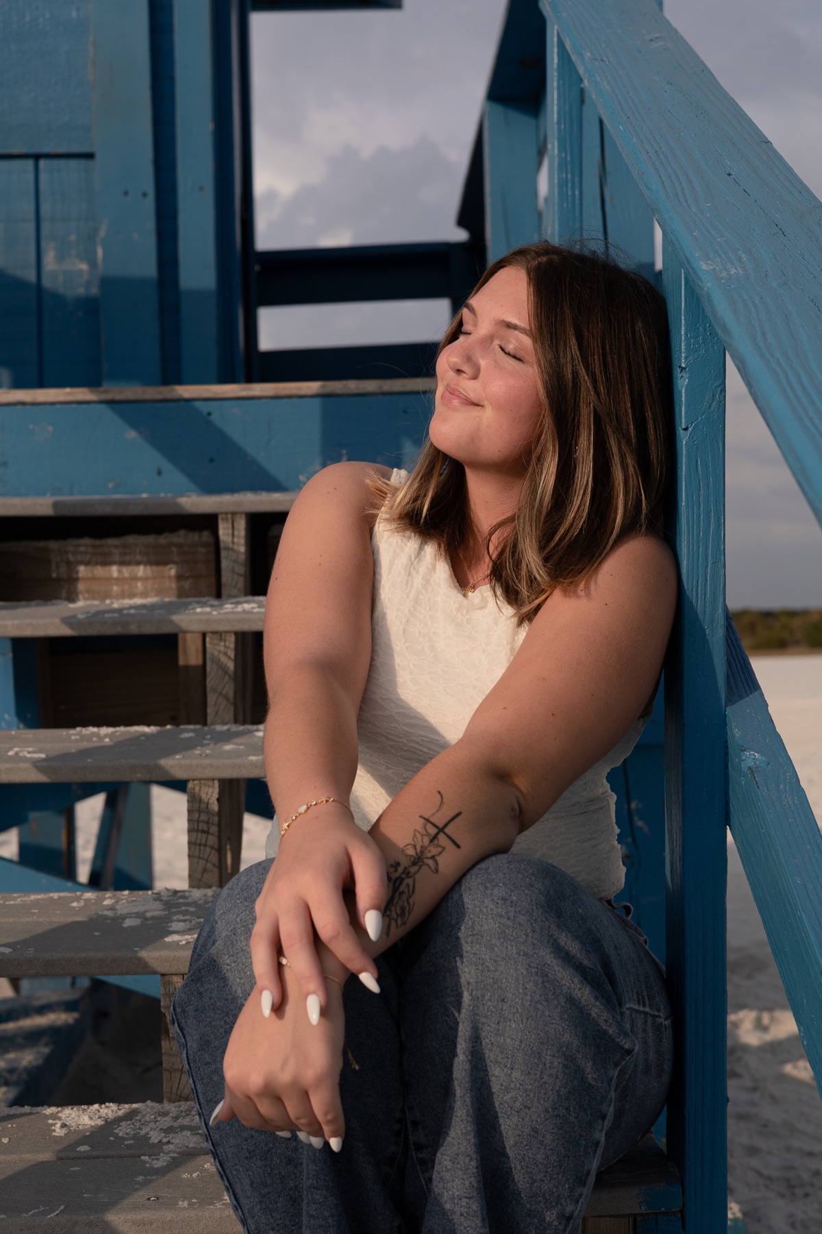 Tender pause, eyes closed in soft directional light