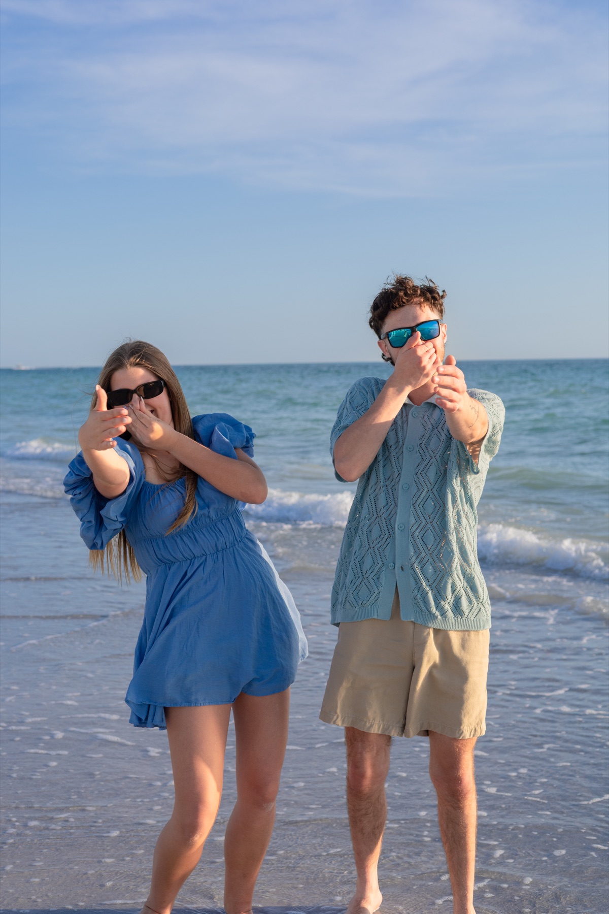 Brother and sister beach session in golden light