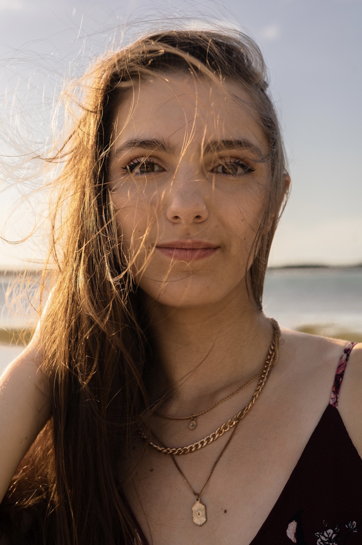 Close portrait, freckles and sun-kissed hair